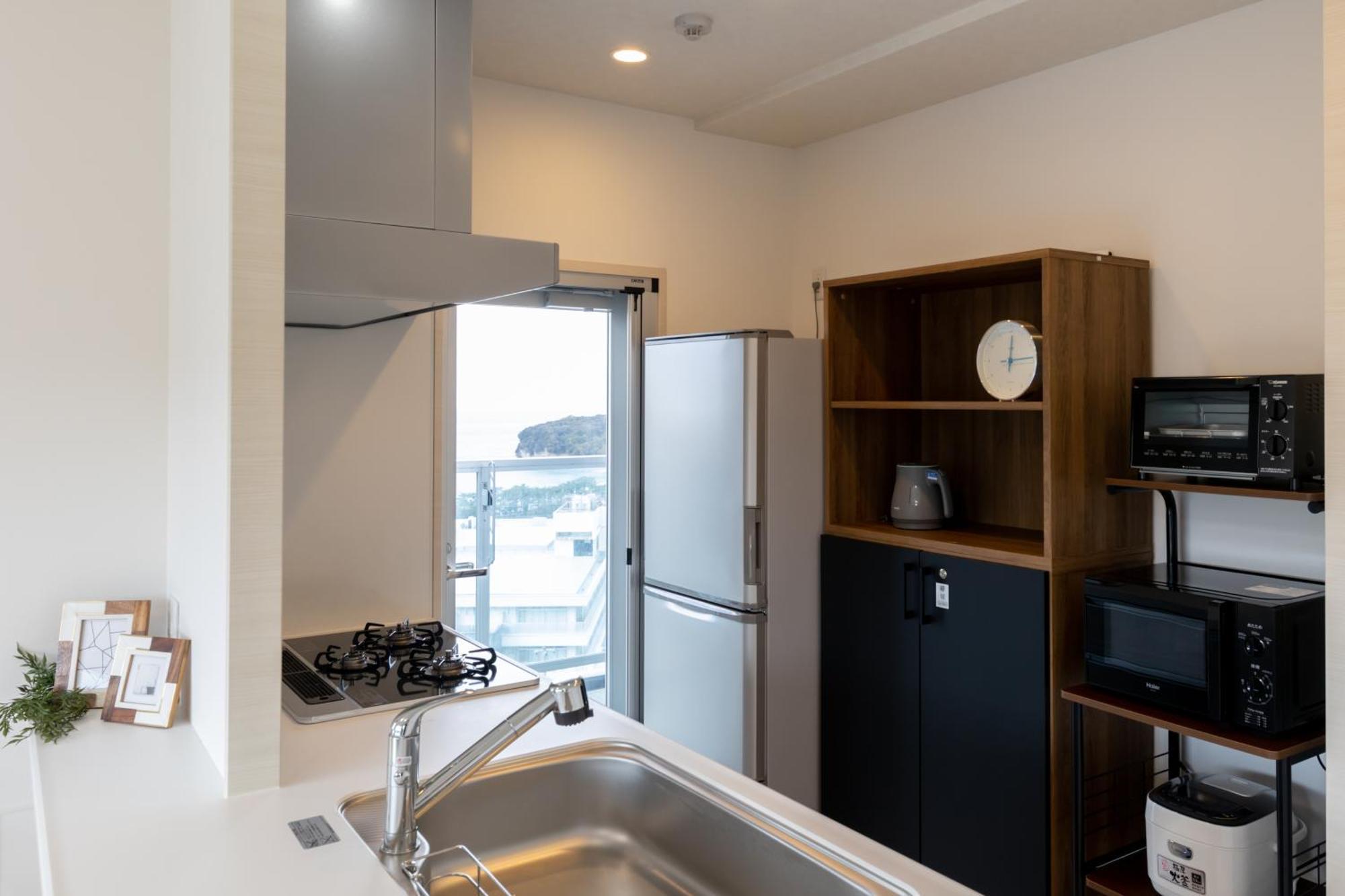 クリスタルエグゼ南紀白浜2 Aparthotel Shirahama Rum bild